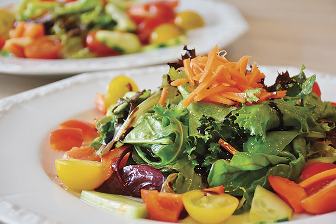 Close Up of Fresh Salad Cornerstone Pizza